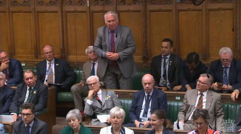 Sir Mike Penning MP speaking in the House of Commons