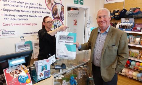 Sir Mike Penning visits the Rennie Grove Peace charity shop on Maylands Avenue