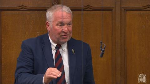 Sir Mike Penning MP speaking in the House of Commons